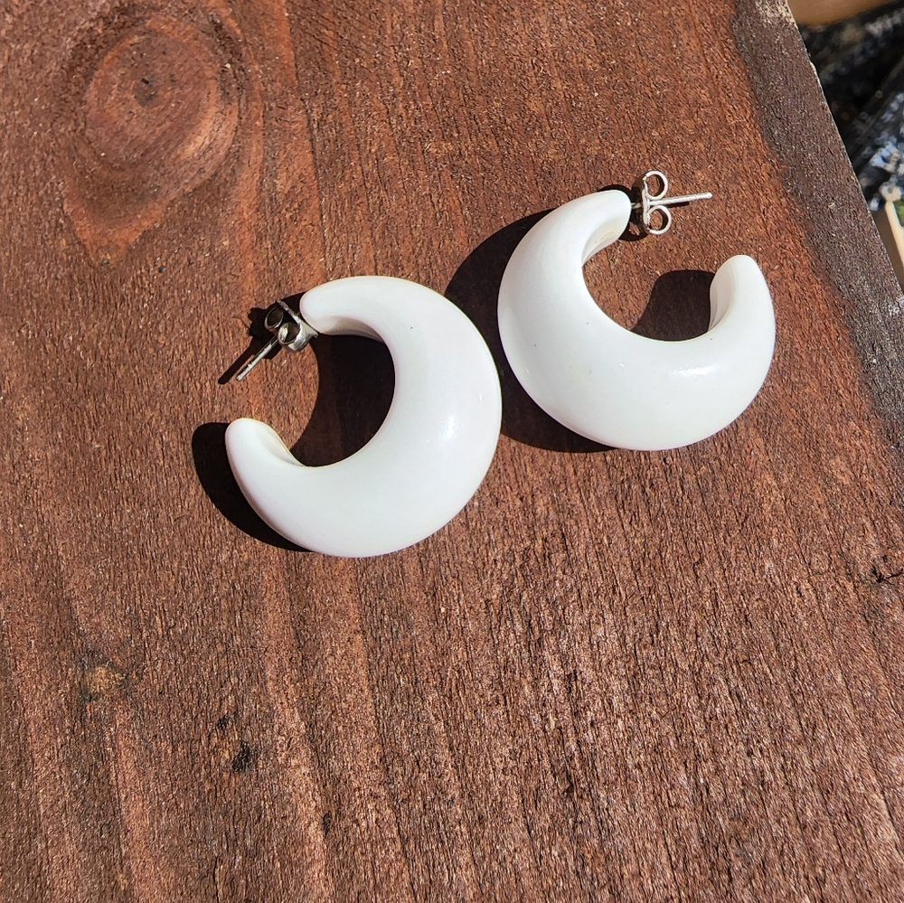 White earrings half hoop style
